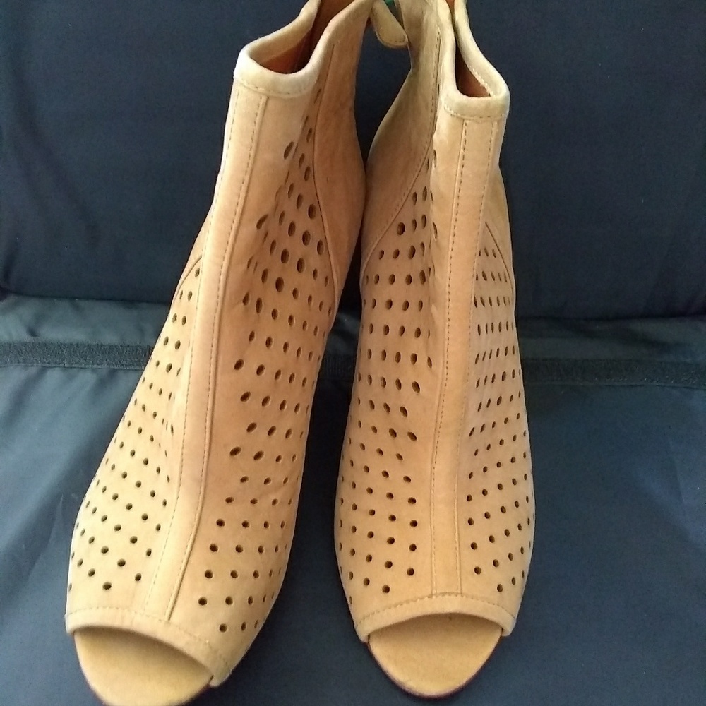 Perforated Leather Ankle Bootie.